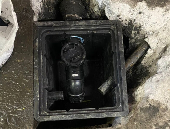 commercial plumbing job sump pump