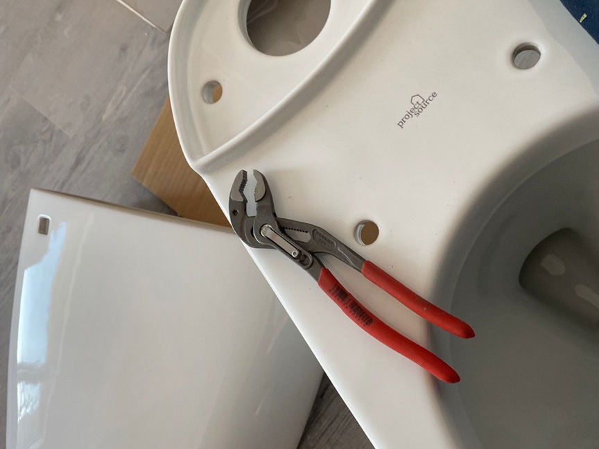 white bathroom toilet repair