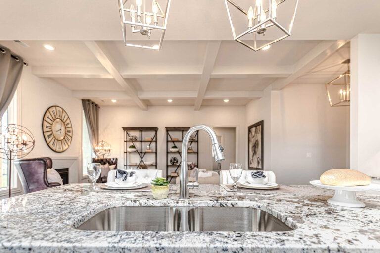 kitchen with marble counter tops and silver sink