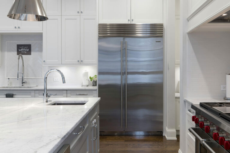 renovated kitchen with large fridge