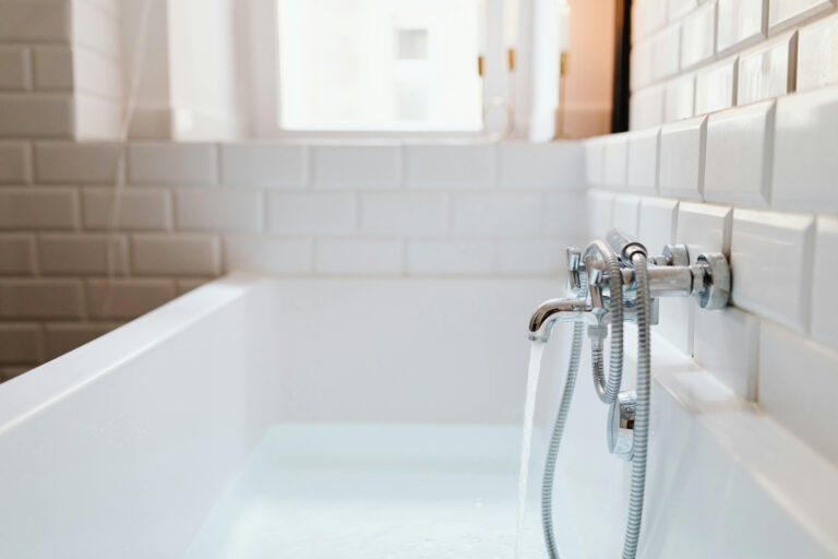 silver bathtub faucet