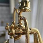 gold bathtub faucet